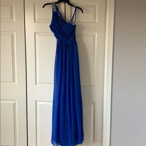 Long blue prom dress with open back